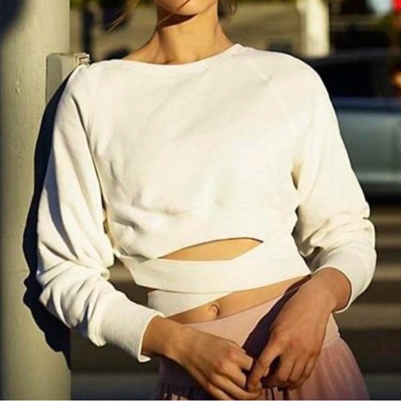 Free People Tops - Preloved Free People Movement fleece “cropped”sweatshirt. Color: Cream. Size: S